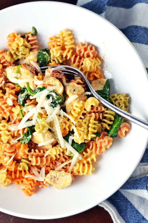 Freshly grated asiago cheese on Asiago Chicken Pasta.