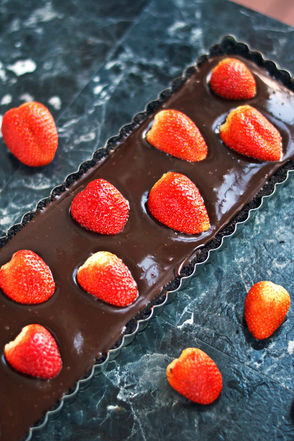 Plump juicy strawberries placed in No Bake Strawberry Chocolate Tart